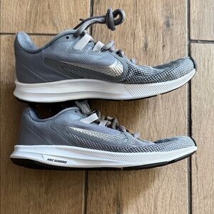 Nike women’s Gray and White Athletic Shoes